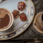 Distressed Wood - Cup Of Coffee With Dates On A Serving Tray