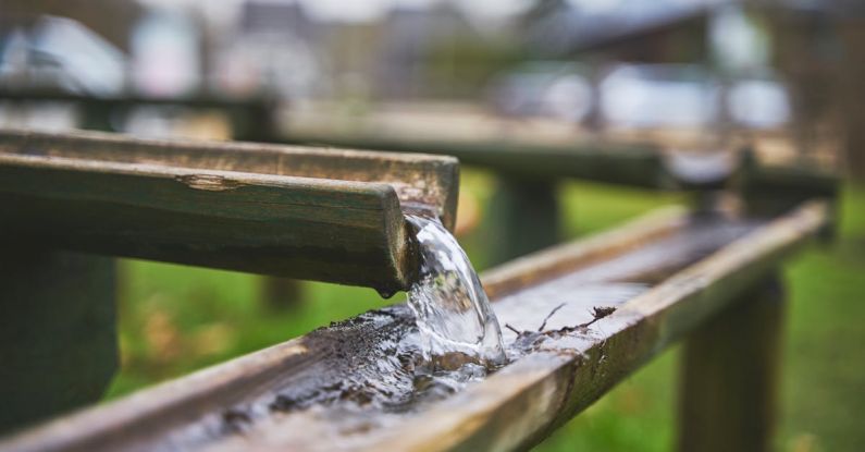Irrigation System - Flowing Water on Bamboo Stalks