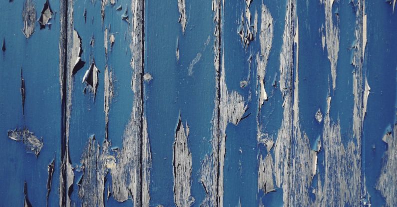 Peeling Paint - Gray Wall With Cracked Blue Paint