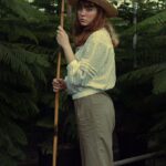 Vertical Gardening - Woman Holding a Gardeners Stick