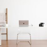 Hardwood Table - Silver MacBook on White Table