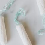 Unused Space - Set of tampons on white surface