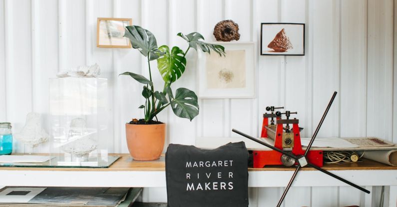 Mass-Produced Furniture - Chair near table in studio with manufactured bag