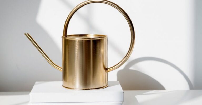 Countertop - A Metal Watering Can on a Countertop