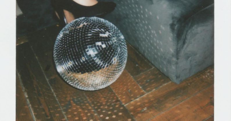 Durable Flooring - Gray Disco Ball on Brown Wooden Surface