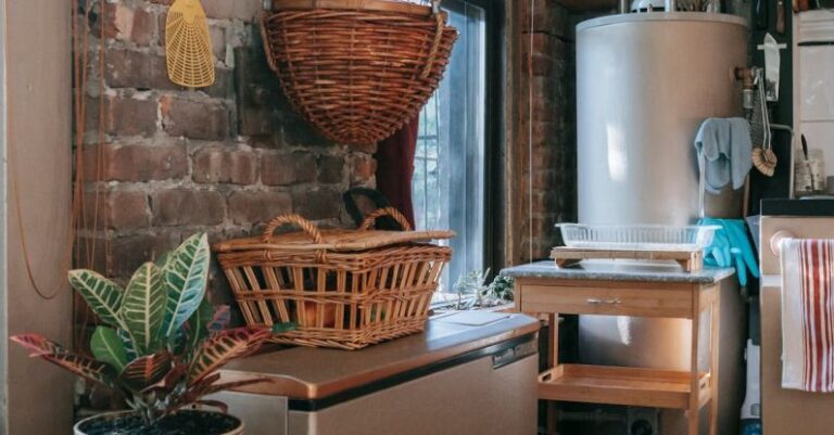 Appliance Storage - Interior of kitchen with brick wall decorated with wicker baskets